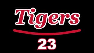 Le mot Tigers en écriture script rouge avec un contour blanc, un trait de soulignement et le numéro 23
